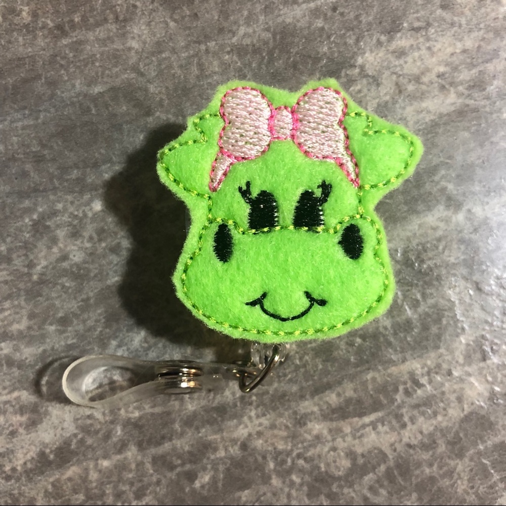 Adorable girly dinosaur Badge Reel
